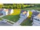 Suburban house with a well-kept yard near a pond, showing curb appeal and neighborhood setting at 112 Aspire Cir, Wingate, NC 28174