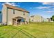 Large backyard with a gazebo-covered patio perfect for relaxation and outdoor entertainment at 112 Aspire Cir, Wingate, NC 28174