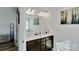 Bathroom with double sinks, modern vanity, and good lighting at 112 Aspire Cir, Wingate, NC 28174