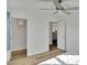 Bedroom featuring hard wood floors and two access doors at 112 Aspire Cir, Wingate, NC 28174