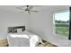 Bedroom with view to the outside and neutral color palette at 112 Aspire Cir, Wingate, NC 28174