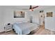 Bright bedroom with hard wood floors and ceiling fan at 112 Aspire Cir, Wingate, NC 28174