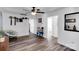 Bright living room featuring hard wood floors and white walls at 112 Aspire Cir, Wingate, NC 28174