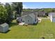 An aerial view showing the home, backyard, and the surrounding neighborhood at 113 Ervin St, Belmont, NC 28012
