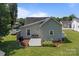 This home includes a backyard featuring a patio and a well maintained lawn at 113 Ervin St, Belmont, NC 28012