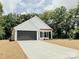Charming single-Gathering home with a well-maintained lawn and an inviting concrete driveway at 118 3Rd Nw Ave, Conover, NC 28613