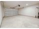 Clean, bright garage with overhead door and ample space for vehicles and storage at 118 3Rd Nw Ave, Conover, NC 28613