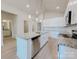 Well-equipped kitchen featuring an island, granite countertops, and stainless steel appliances at 118 3Rd Nw Ave, Conover, NC 28613