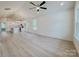 Spacious living room featuring modern flooring, recessed lighting, and a ceiling fan at 118 3Rd Nw Ave, Conover, NC 28613