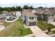 Aerial view of a two-story home with a two-car garage in a residential neighborhood at 1207 Skyflower Way, Charlotte, NC 28214