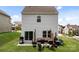 Spacious backyard featuring a patio area perfect for outdoor entertaining and relaxation at 1207 Skyflower Way, Charlotte, NC 28214