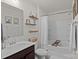 Bright bathroom with a shower-tub combo and a single sink vanity at 1207 Skyflower Way, Charlotte, NC 28214