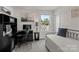 Bright bedroom with a desk, workstation, and a comfortable daybed near the window at 1207 Skyflower Way, Charlotte, NC 28214