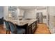 Kitchen features granite countertops, stainless steel appliances, and an island cooktop at 12644 Lahinch Ct, Charlotte, NC 28277