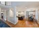 Bright open-concept kitchen with a large island, stainless steel appliances, and hardwood floors at 12644 Lahinch Ct, Charlotte, NC 28277