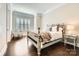 Cozy bedroom with hardwood floors, natural light, and a serene atmosphere at 14041 Mccord Rd, Huntersville, NC 28078