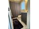 Bathroom features a shower and a gray vanity at 14608 Waterside Dr, Charlotte, NC 28278