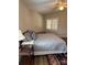 Bedroom with a queen-sized bed and a window with blinds at 14608 Waterside Dr, Charlotte, NC 28278