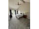 Well-lit bedroom with vaulted ceiling and access to a private balcony at 14608 Waterside Dr, Charlotte, NC 28278