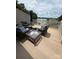 Spacious deck with comfortable seating and a view of the water at 14608 Waterside Dr, Charlotte, NC 28278