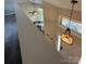 Bright foyer with chandelier view into the kitchen at 14608 Waterside Dr, Charlotte, NC 28278