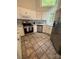 Well-equipped kitchen with stainless steel appliances, stylish backsplash, and ample cabinetry at 14608 Waterside Dr, Charlotte, NC 28278