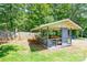 A backyard shed offers ample seating and shade at 14821 Cumberland Dr, Charlotte, NC 28227