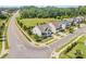 Aerial shot showcases a beautiful home, lush greenery, and a well-planned neighborhood layout at 15103 Keyes Meadow Way, Huntersville, NC 28078