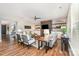Cozy living room featuring a fireplace, built-in shelving, and comfortable seating at 15103 Keyes Meadow Way, Huntersville, NC 28078