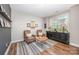 Cozy sitting area with comfortable seating, stylish decor, and large window for natural light at 15103 Keyes Meadow Way, Huntersville, NC 28078