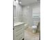 The bathroom boasts a new vanity, modern fixtures, and sleek marble-look tiling at 1535 Jordan St, Lancaster, SC 29720