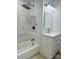 Updated bathroom featuring modern fixtures, a tub, and new marble-look tile at 1535 Jordan St, Lancaster, SC 29720
