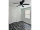 Cozy bedroom featuring a ceiling fan, window and hardwood floors at 1535 Jordan St, Lancaster, SC 29720