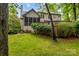 Backyard with a screened porch and deck, ideal for outdoor living and entertaining at 17433 Glassfield Dr, Huntersville, NC 28078