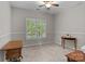Neutral bedroom with natural light, plantation shutters, ceiling fan, and neutral carpet at 17433 Glassfield Dr, Huntersville, NC 28078
