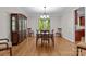 Dining room featuring hardwood floors, chandelier, and natural light at 17433 Glassfield Dr, Huntersville, NC 28078