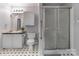 Bathroom featuring a shower, toilet, and sink at 1909 Mountain Springs Church Rd, Monroe, NC 28112