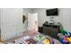 Comfortable bedroom featuring a TV and colorful decor at 1909 Mountain Springs Church Rd, Monroe, NC 28112