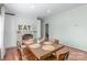 Cozy dining area with stone fireplace and large table, perfect for Gathering dinners and entertaining at 1909 Mountain Springs Church Rd, Monroe, NC 28112