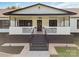 View of covered front porch with stairs and railing at 1909 Mountain Springs Church Rd, Monroe, NC 28112