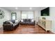 Inviting living room with hardwood floors, neutral paint, and comfortable furniture at 1909 Mountain Springs Church Rd, Monroe, NC 28112
