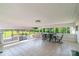 Bright and airy patio with tiled floors, perfect for outdoor dining and entertaining at 1909 Mountain Springs Church Rd, Monroe, NC 28112