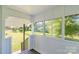 Covered porch featuring great natural light and peaceful outdoor view of the surrounding landscape at 1909 Mountain Springs Church Rd, Monroe, NC 28112