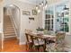 Charming dining area with hardwood floors, stylish chairs, and an elegant light fixture at 1912 Dawnhurst Ln, York, SC 29745