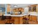 Well-appointed kitchen with light wood cabinetry, stainless steel appliances and breakfast bar seating at 1912 Dawnhurst Ln, York, SC 29745