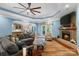 Spacious living room with a fireplace, hardwood floors and access to the outdoors at 1912 Dawnhurst Ln, York, SC 29745