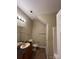Bathroom with a vanity, mirror, sink, toilet, and shower at 2012 Ashley Rd, Charlotte, NC 28208