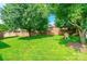 Lush backyard featuring mature trees and a small playhouse, perfect for outdoor enjoyment at 2079 Audubon Dr, Rock Hill, SC 29732