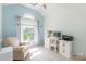 Bright bedroom featuring vaulted ceilings and an arched window with modern desk at 2079 Audubon Dr, Rock Hill, SC 29732