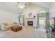 Spacious living room featuring vaulted ceilings, a fireplace, and large windows with views of the outdoors at 2079 Audubon Dr, Rock Hill, SC 29732